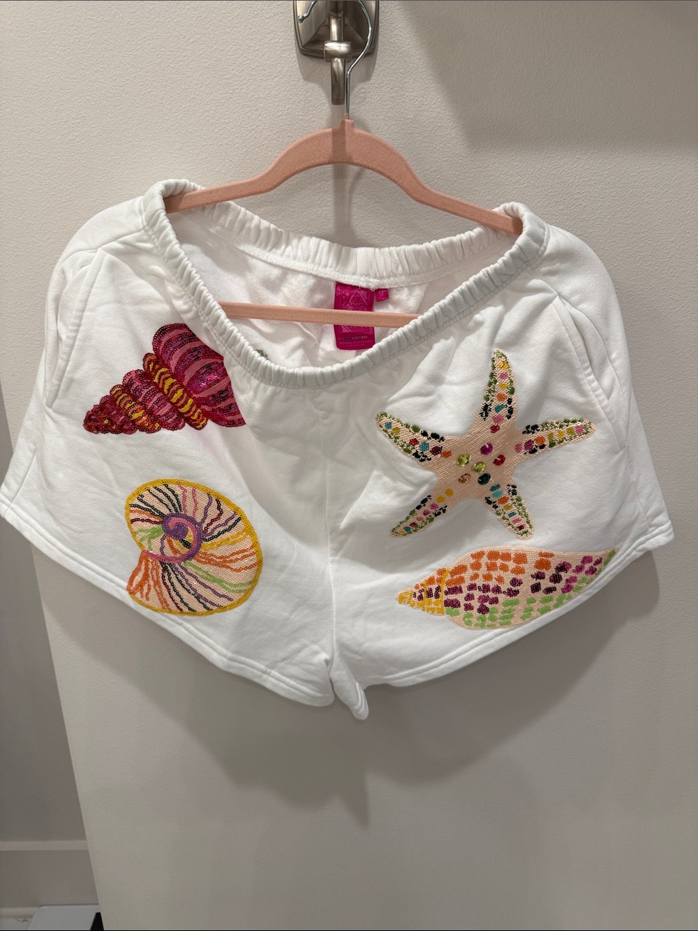 QUEEN OF SPARKLES White Shorts with Multicolor Sequin Shell Motifs